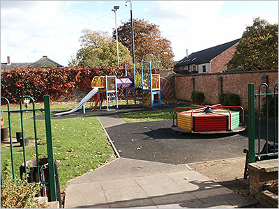Photograph of Children's Playground showing slide and roundabout