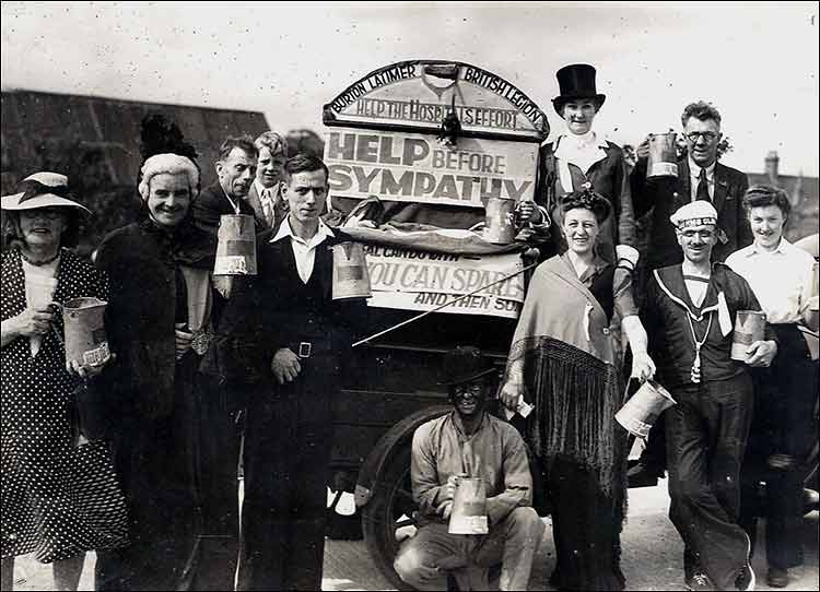 Gala Day 28July 1945.  Collection by the British Legion.  Left of Barrel Organ: Lennie Underwood, Harry Cox,  Gerald Lewis (and son?), Gerald Toop.  Right of Barrel Organ: Madge Sanderson, ? John Timpson.  At rear: Harold Timpson, Mrs Clark.  Billy Brace at front,  Sailor unidentified.