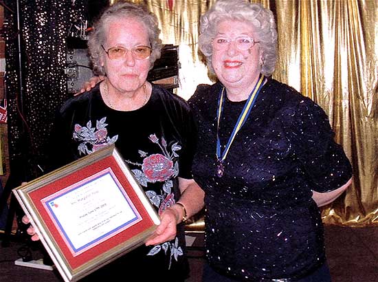 Chairperson Margaret Heels receiving her award from Branch President Janet Peck